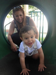 Esther and Cristian playing in the park