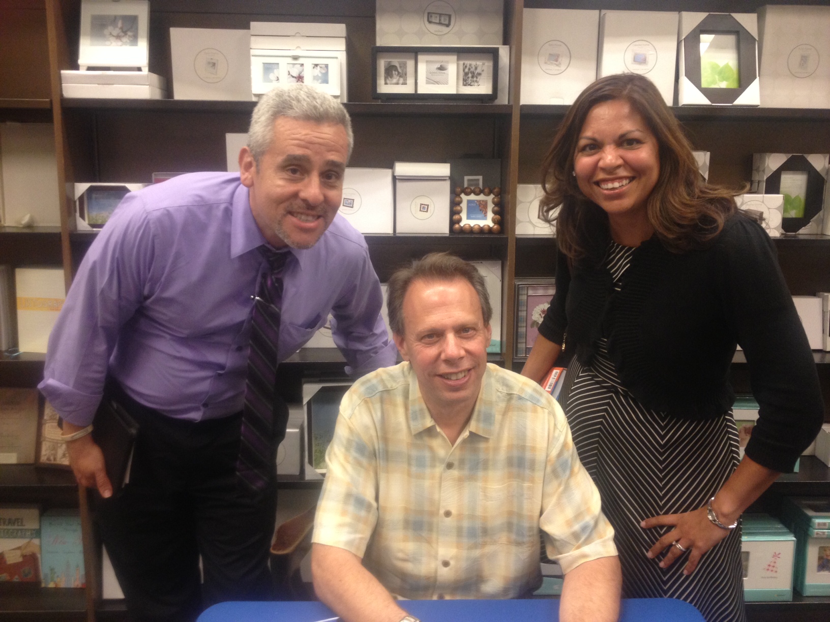 Esther and I with New York Mets' broadcaster Howie Rose. My salt and pepper hair is now dyed brown.