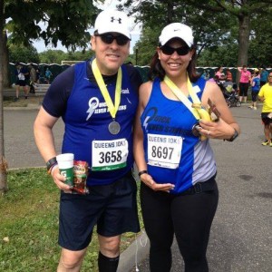 Esther and I showing our bellies after last June's Queens 10K