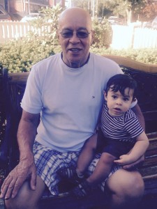 Cristian and his Godfather relaxing in the yard.